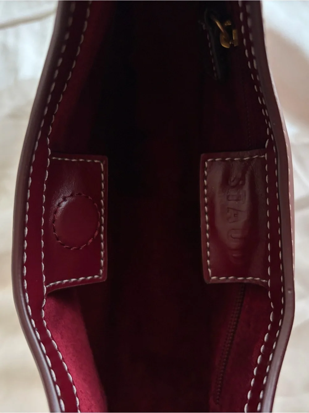 STAUD Crescent Shoulder Bag in Burgundy Red